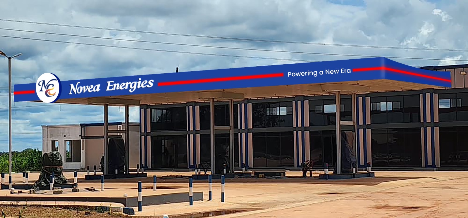 A Novea Energies fuel forecourt in Zambia, blue canopy branded &lsquo;Novea Energies &mdash; Powering a New Era&rsquo;